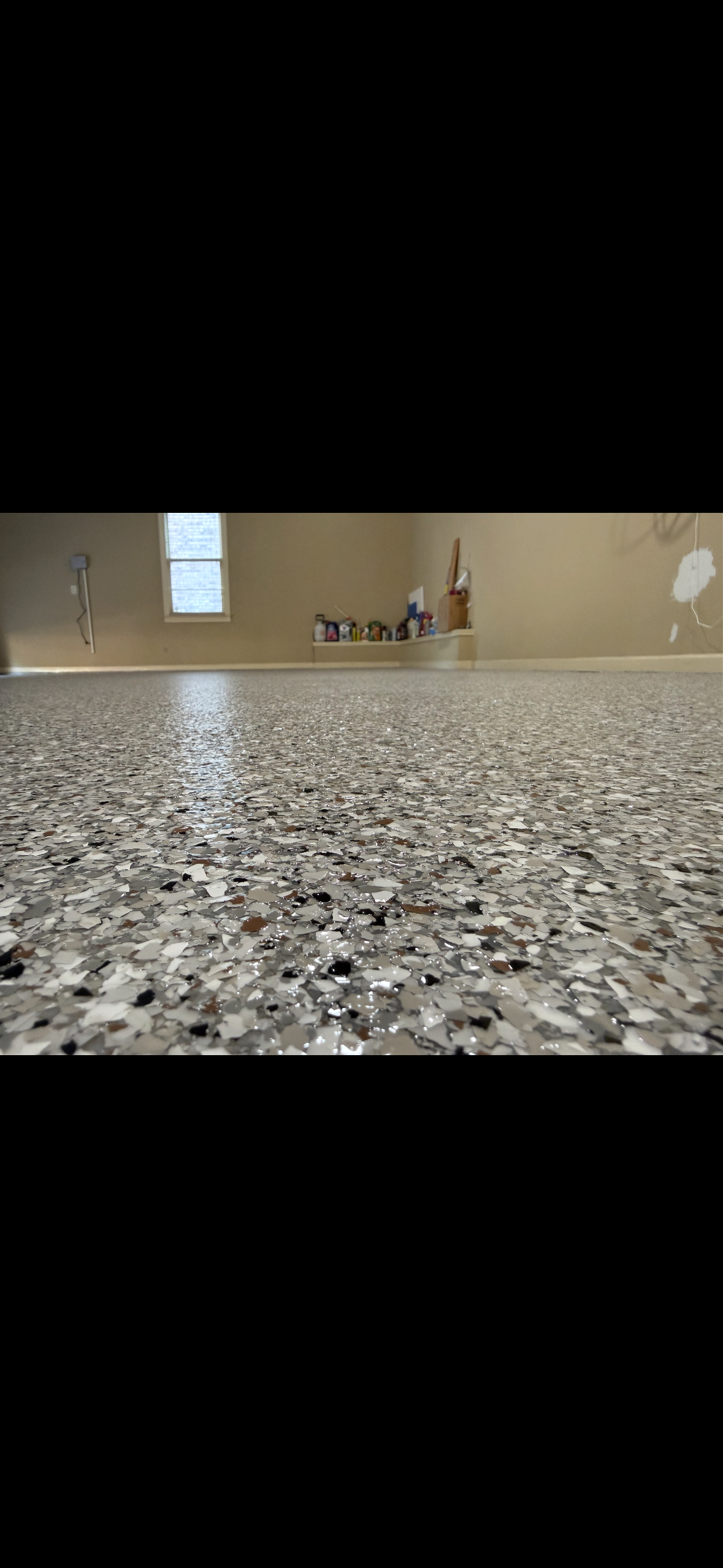 Gray Flake Epoxy Garage Floor Close-Up